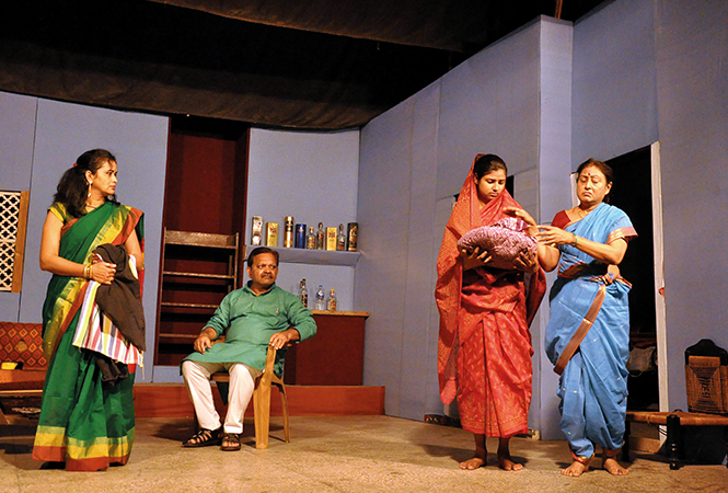 A scene from the play Kamla (BCCL) A scene from the play Kamla (BCCL)