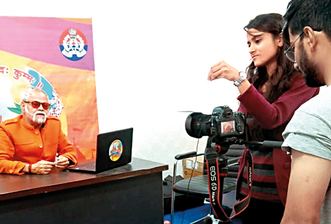 Sanjay Mishra shooting for the news bulletin at SSP Office in Kumbh Mela, Prayagraj (BCCL)
