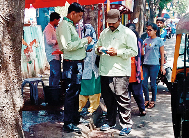 Two of the marshals who demanded a fine of Rs 200