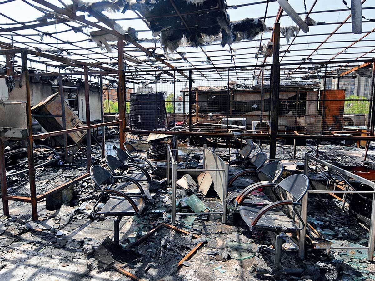 Destroyed canteen (above); babies being evacuated (right); Pic: JIGNESH VORA Destroyed canteen (above); babies being evacuated (right); Pic: JIGNESH VORA
