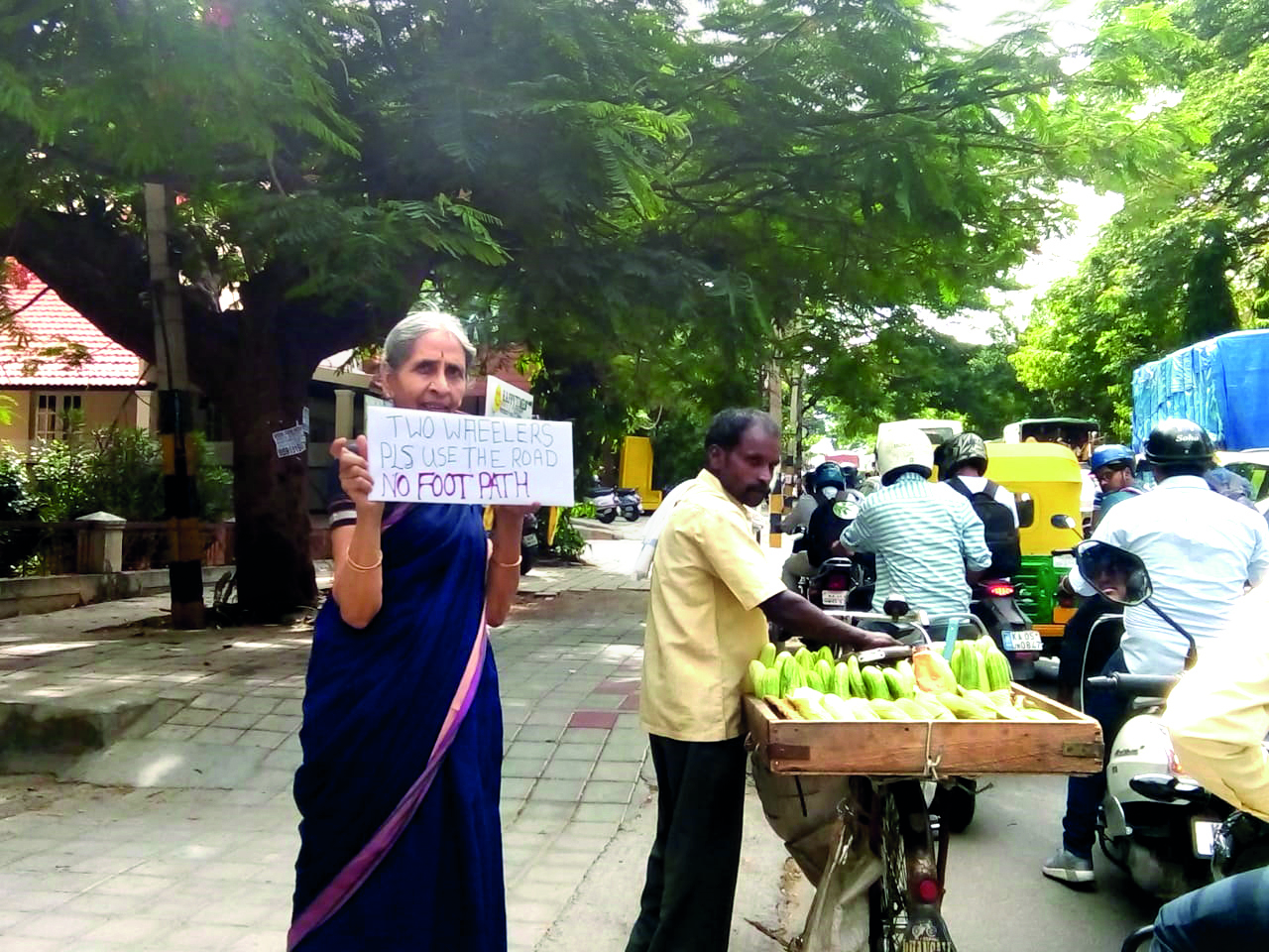 Usha Srikantan with a placard