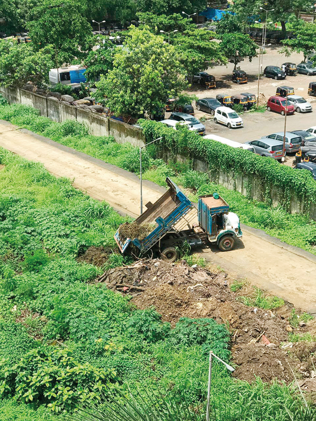 WHERE HAS THIS TRUCK COME FROM? Residents say seven trucks have dumped muck at the Juhu airport land since Thursday