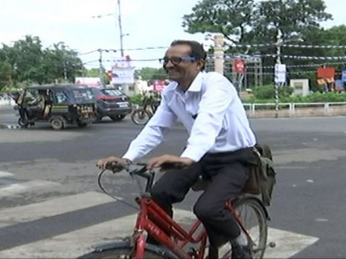 Gopal Trivedi travelling on a bicycle