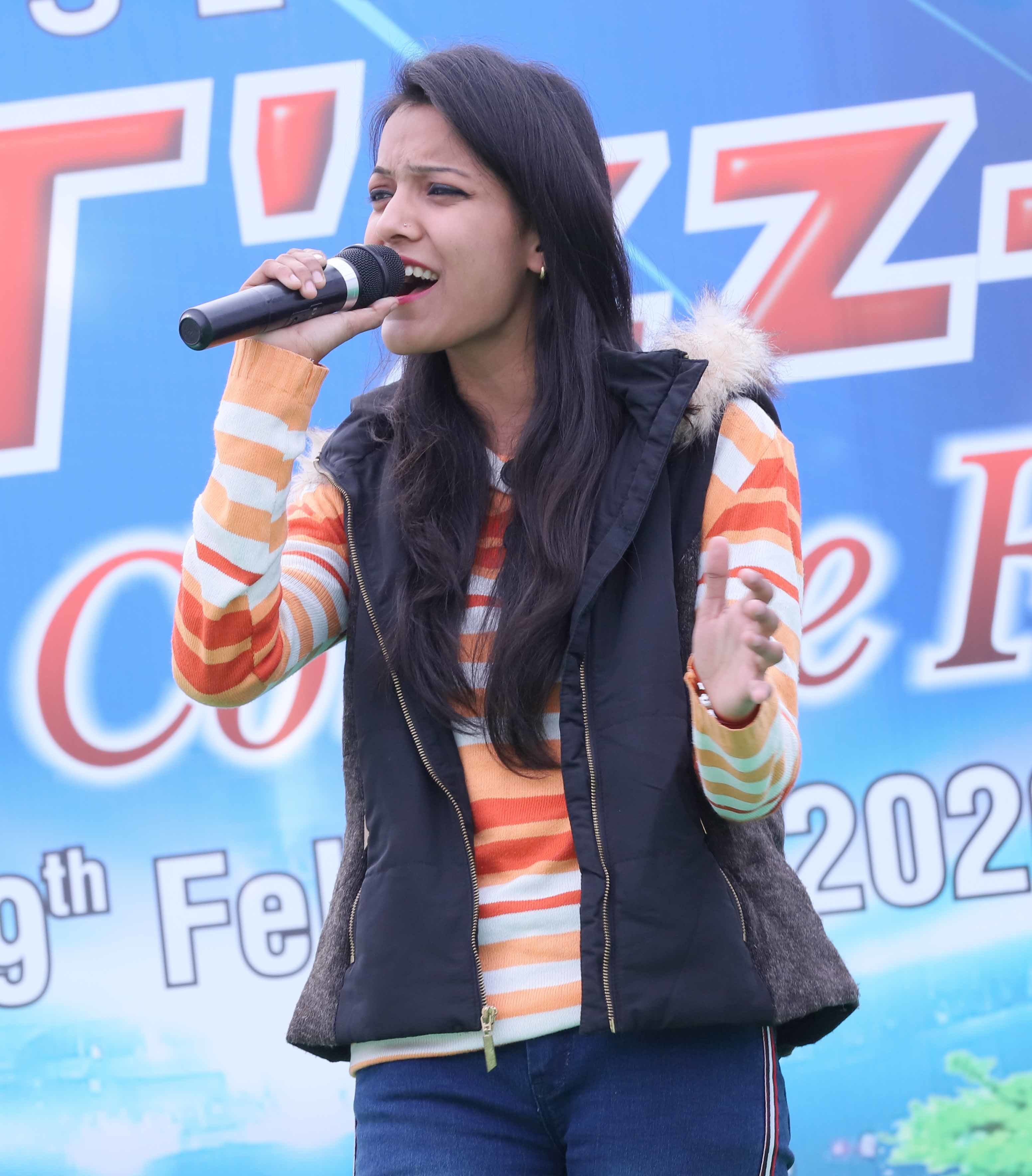 Kirti Kushwaha showcasing her singing talent during the fest