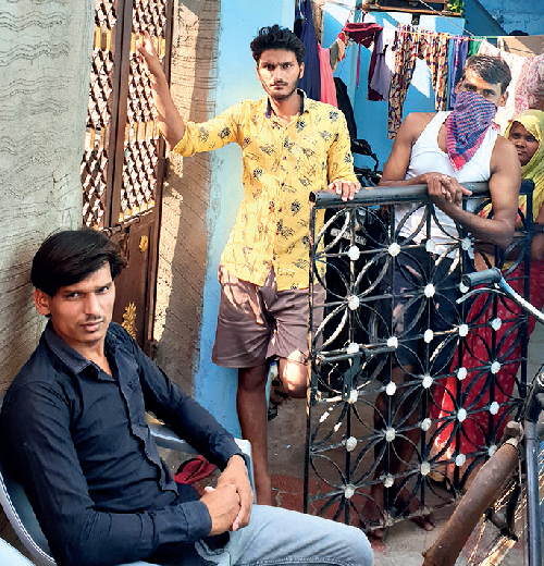 Bhagat’s sons Ramesh (seated) and Anil (in yellow shirt)