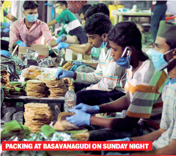 Volunteers of Mercy Mission, and their family members, including children, spent the eve of Eid packing the rotis and meal kits for guest workers at a warehouse in Basavanagudi.