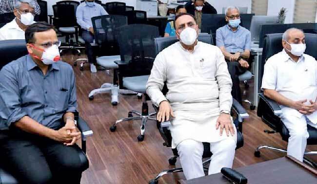 Joint Secy in Health Ministry Lav Agarwal with CM Vijay Rupani and Dy CM Nitin Patel in G’nagar