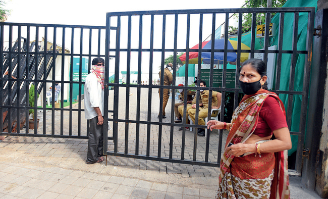 (top L) Relatives, friends of the woman and her parents (above) were outside the facility till 3 am on Monday; they returned later that morning, making desperate enquiries till afternoon
