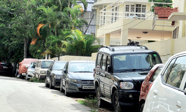 Cars parked in Benson Town, some double parked, some parked on pavements, are creating a problem for residents