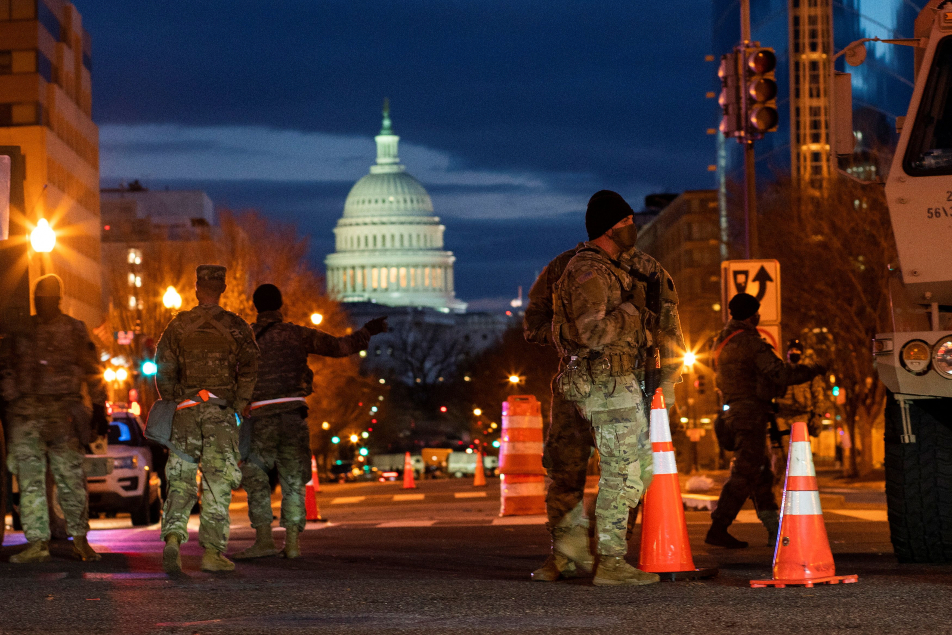 National Guard members get instructions near the Capitol in Washington Reuters 635