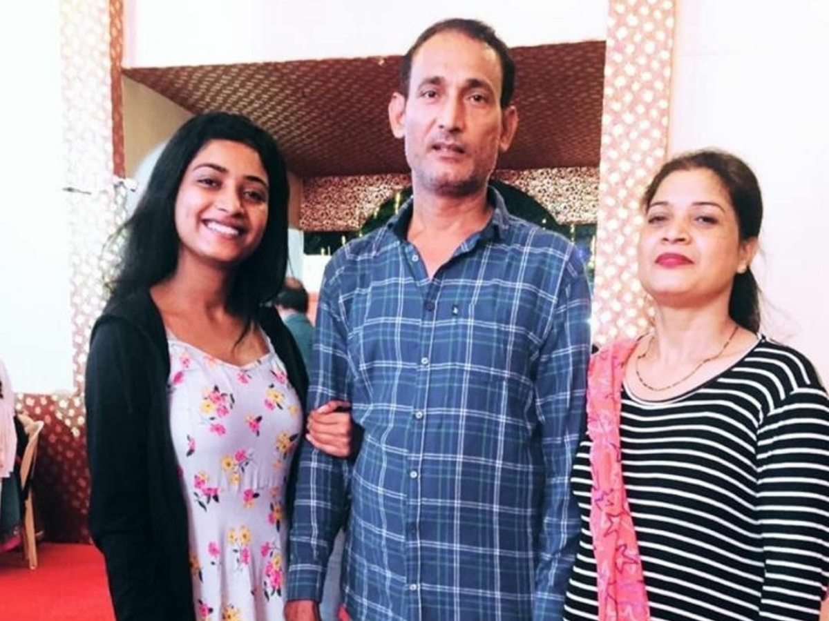 Manya Singh and her parents