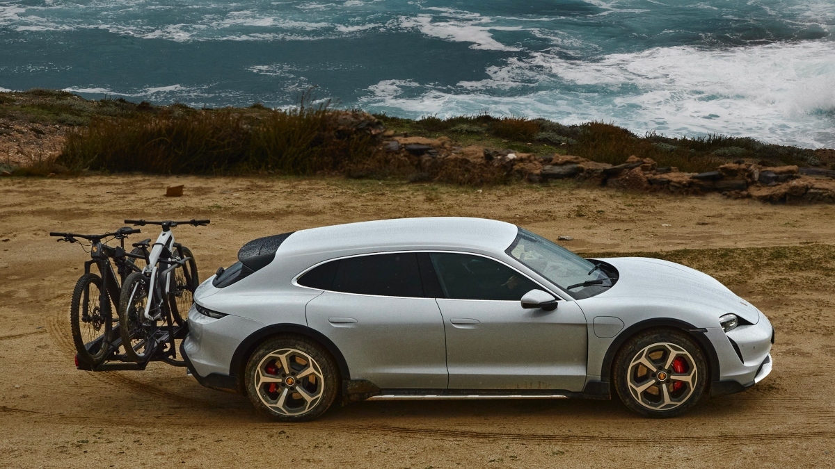 Porsche Taycan Cross Turismo Breaks Cover Flaunts Off Roading Prowess Times Of India