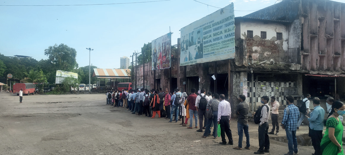 AAKHIR QUEUE? With limited seats in trains, cmmuters have to queue up for hours to catch a bus; many find the bus and cab fares too high