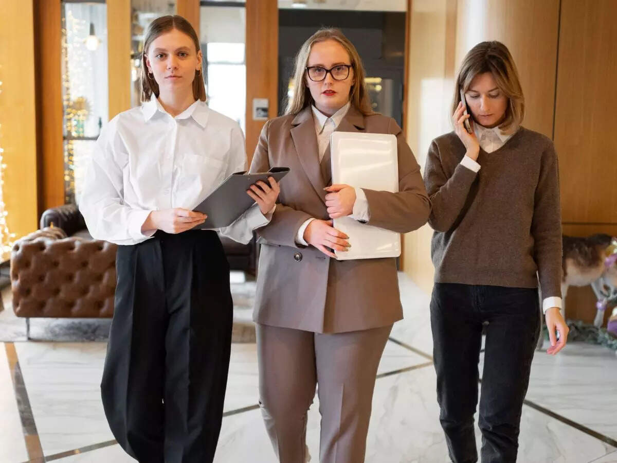 Standing Out By Fitting In: New Employees Strategize For Success In Their Fresh Roles