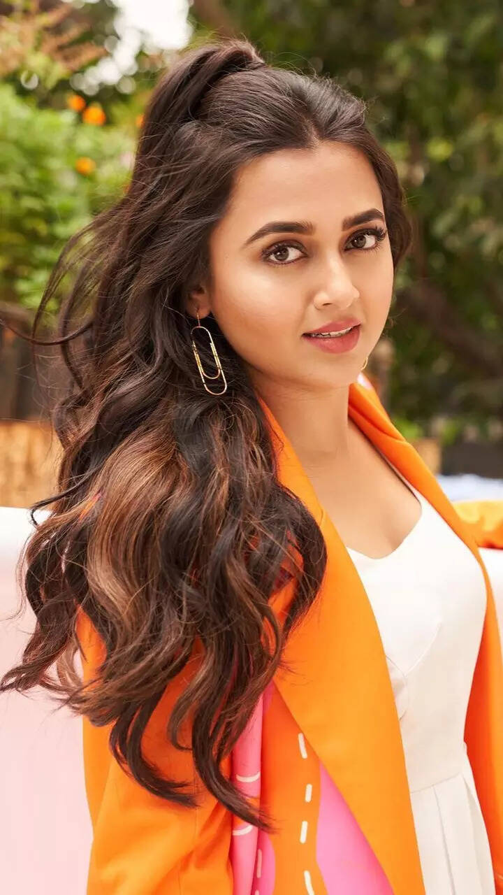 Tejasswi Prakash looks summer ready in white dress and orange blazer