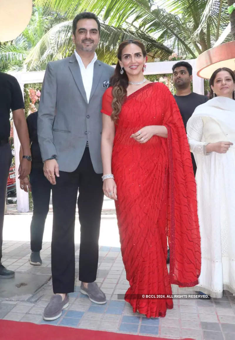 Esha Deol stuns in a red saree at the launch of a jewellery store