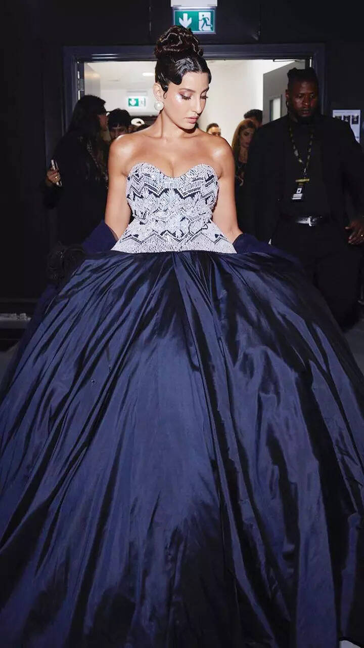 Nora Fatehi channels the 50's glamour in a magnificent royal blue gown