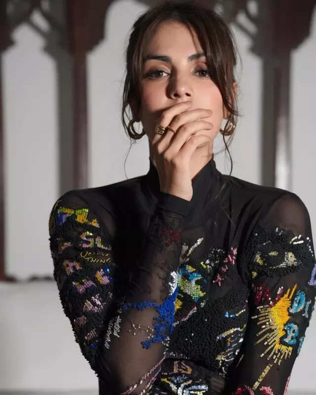 Rhea Chakraborty nails the all-black trend in sheer top and leather pants, see pictures