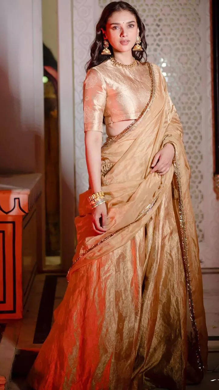 ​Aditi Rao Hydari exudes royalty and elegance in a stunning golden silk lehenga