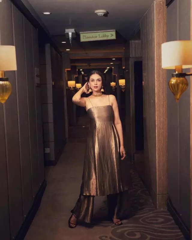 Aditi Rao Hydari is every bit a royal muse in majestic metallic suit and gold jewellery, see pictures
