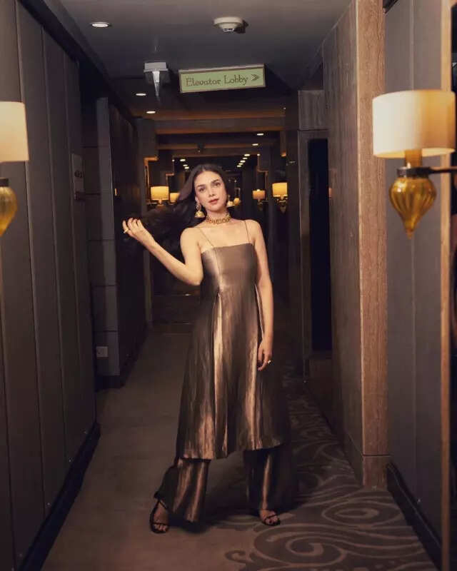 Aditi Rao Hydari is every bit a royal muse in majestic metallic suit and gold jewellery, see pictures