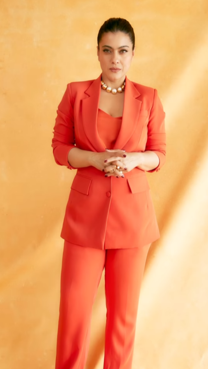 Kajol poses like a boss in orange pantsuit