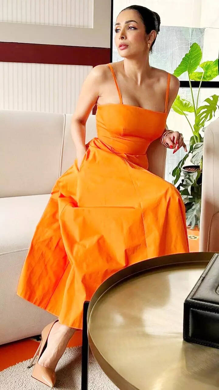 Malaika Arora is the epitome of summer style in vibrant orange dress