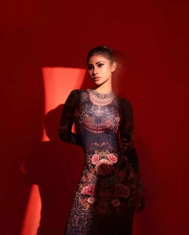 Mouni Roy in multi-colour floral gown is fashionably perfect to beat the gloomy weather, pictures will leave you spellbound