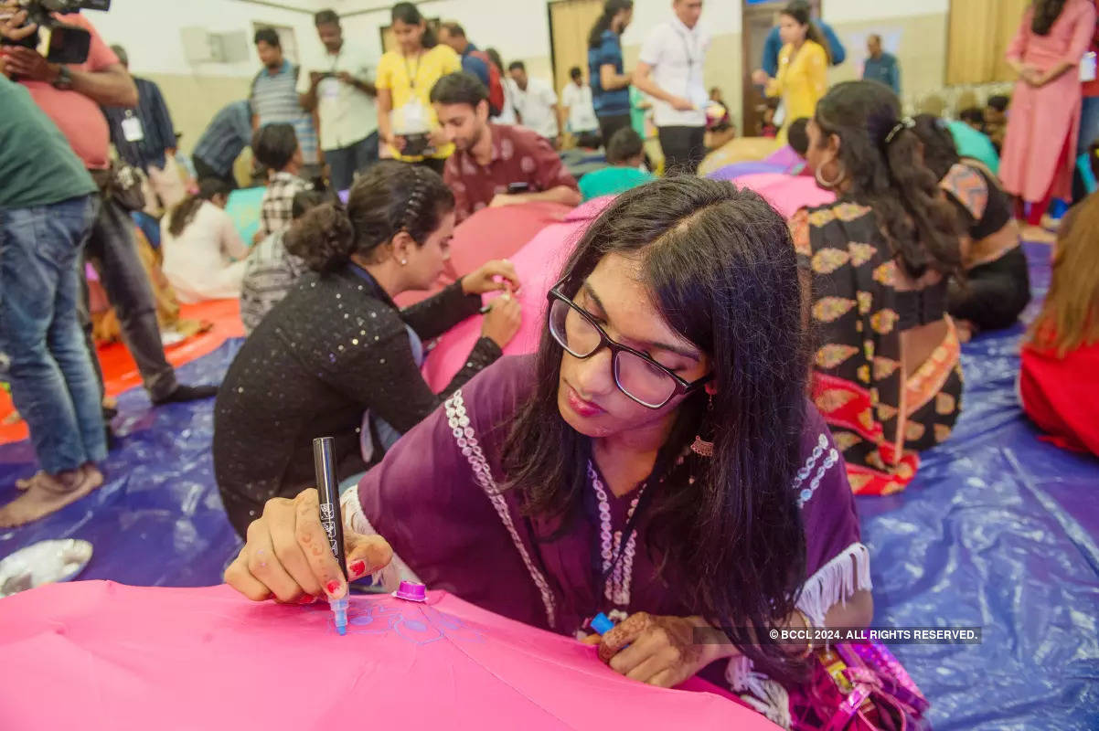 50 members of transgender community along with trans designer Saisha Shinde paint umbrellas at this unique event