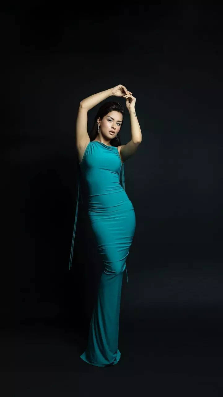 Avneet Kaur commands attention in a ruched teal bodycon gown