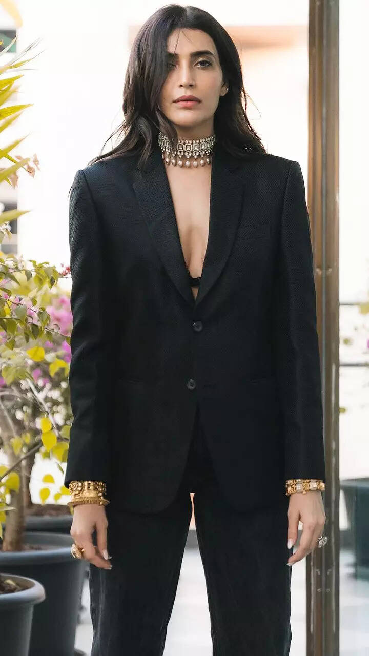 ​Karishma Tanna exudes boss lady vibes in a black power suit with bracelets​