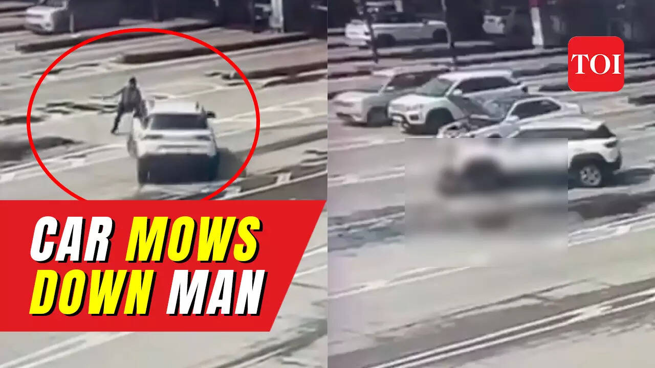 Caught on cam: In a horrific incident, a car driver mows down toll ...