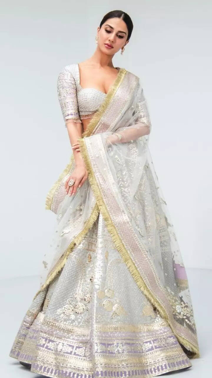 Vaani Kapoor looks dreamy in a gorgeous silver and gold lehenga