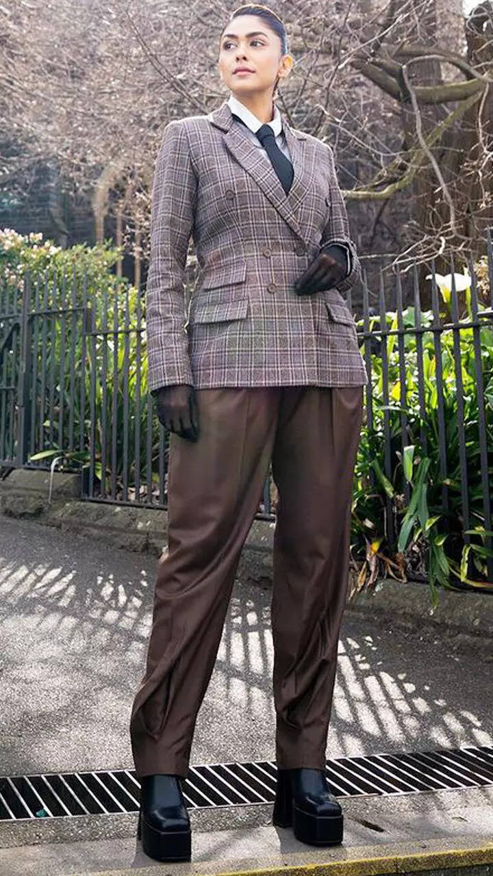 ​Mrunal Thakur exudes major boss lady vibes in a striking suit and tie ensemble​