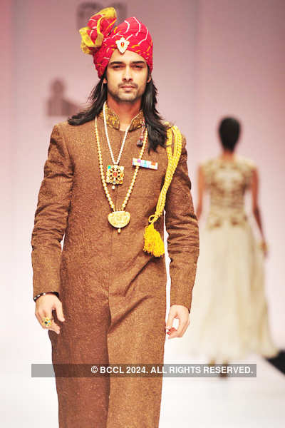 A model walks the ramp in a creation by designer Samant Chauhan on Day ...