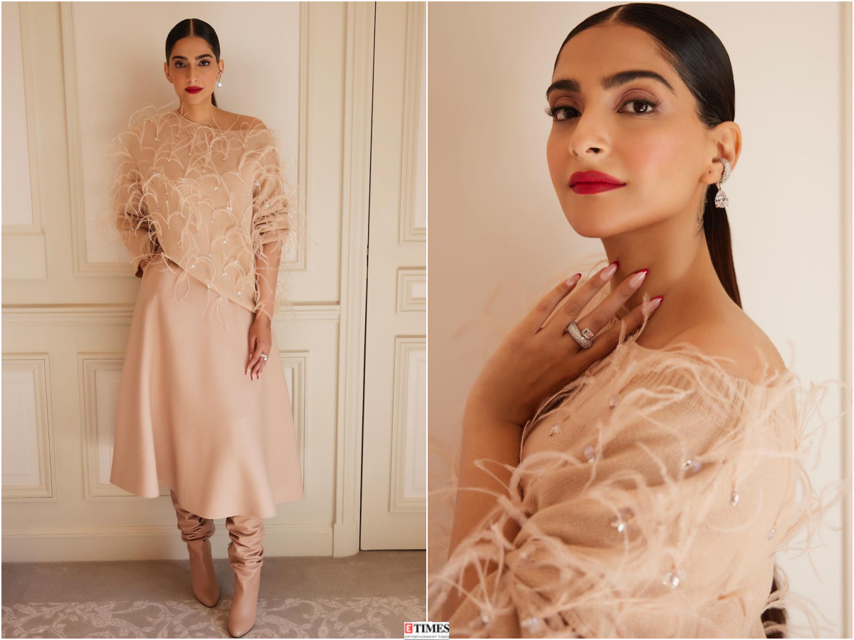 Sonam Kapoor looks classy in an off-shoulder cardigan, midi skirt and stunning boots, see pictures