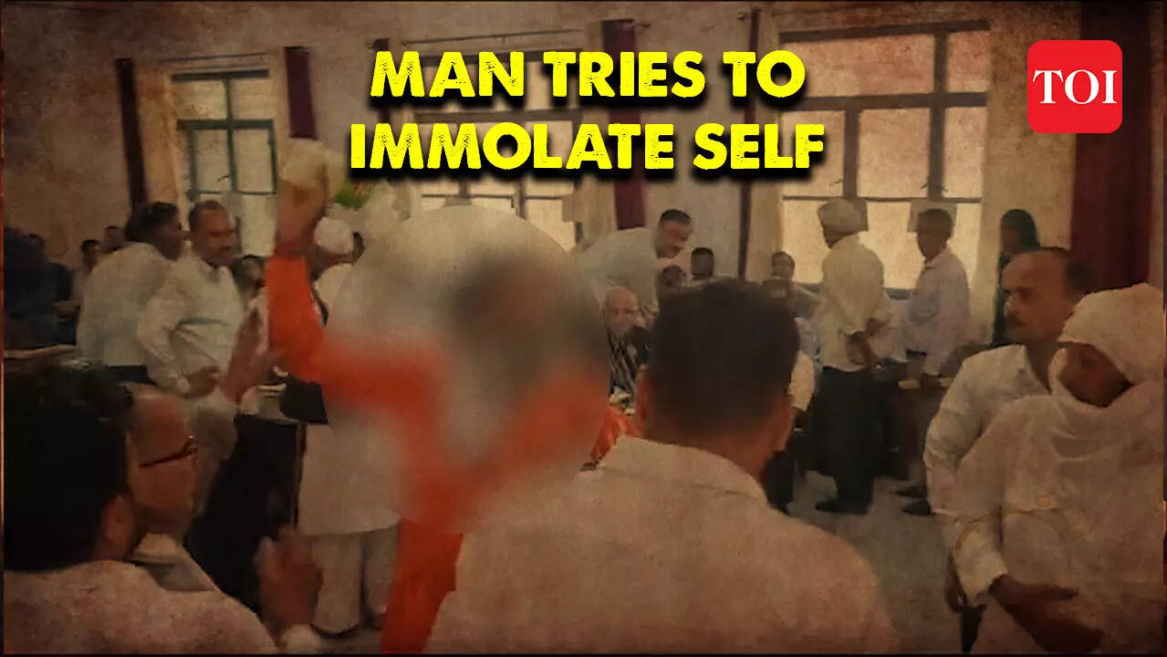 On cam: Man tries to immolate himself in front of District Magistrate ...