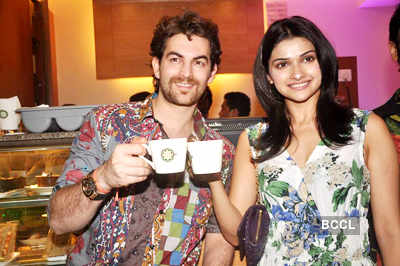 Prachi, Neil @ coffee shop launch