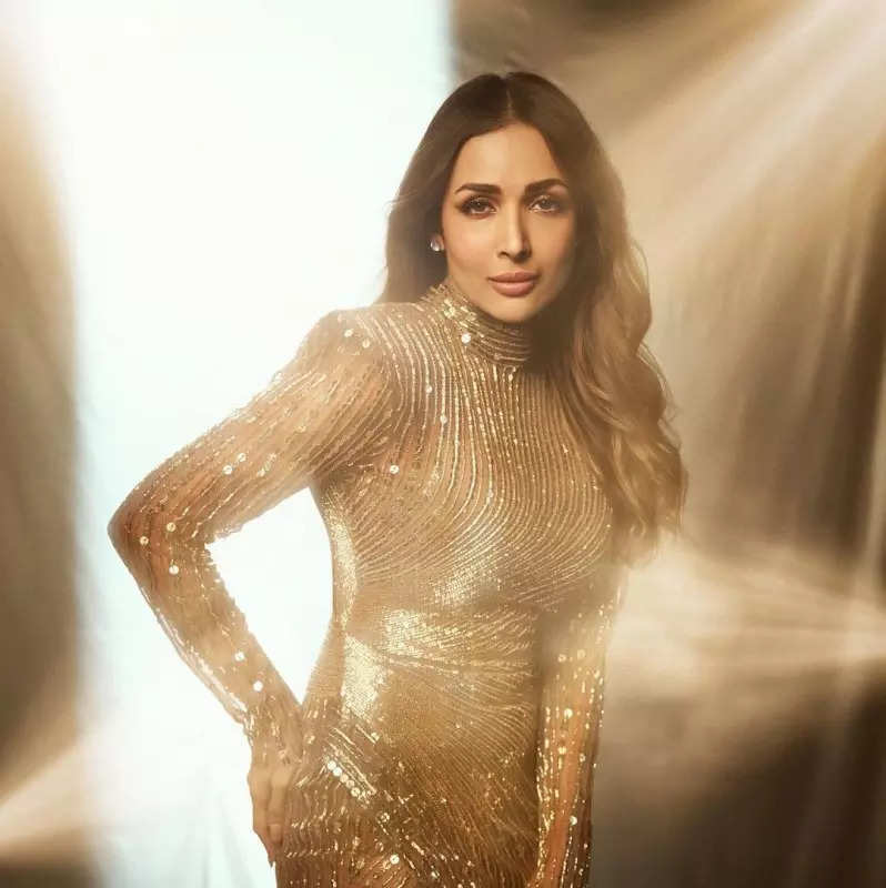 All that glitters is Malaika Arora in a shimmery golden gown, see stunning pictures
