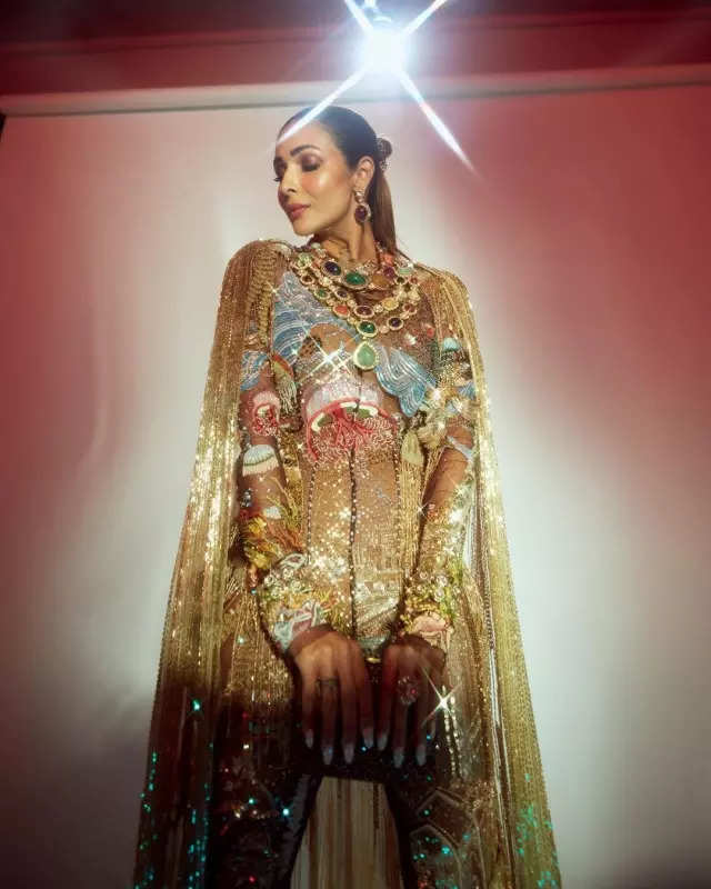 All that glitters is Malaika Arora in a shimmery golden gown, see stunning pictures