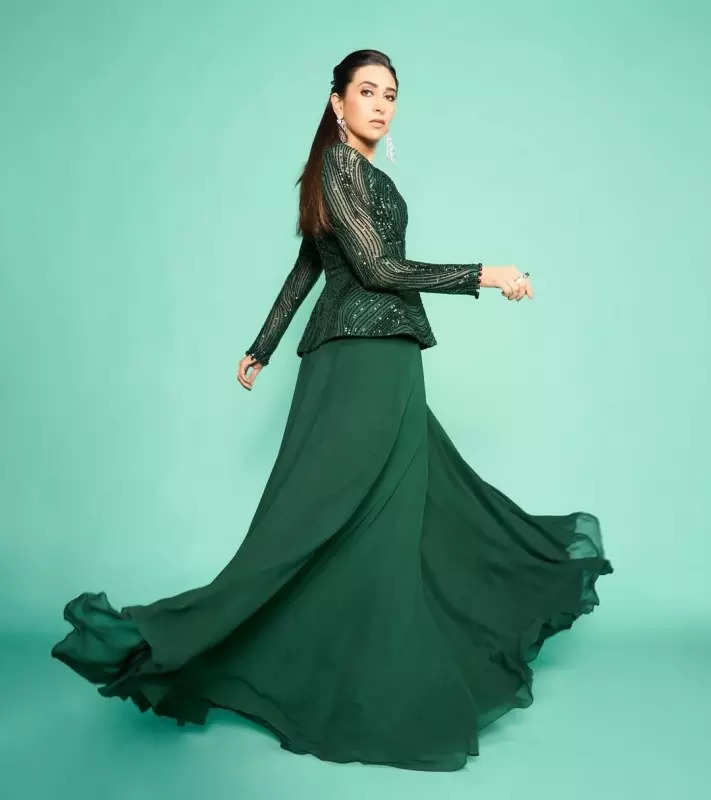 Karisma Kapoor is the ultimate style diva in this emerald green ensemble, see pictures