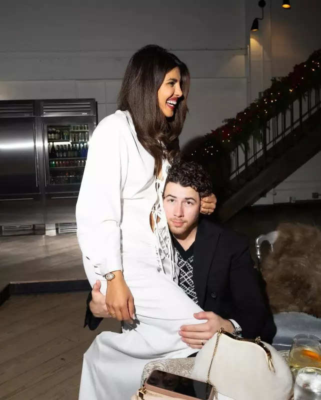 Priyanka Chopra rings in the holiday season in a white outfit for Christmas dinner with Nick Jonas and Malti Marie