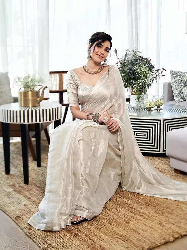 Karishma Tanna mesmerizes in a serene white saree, looking straight out of a dream