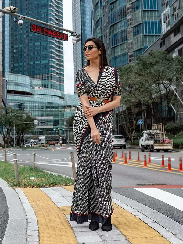 Karishma Tanna mesmerizes in a serene white saree, looking straight out of a dream