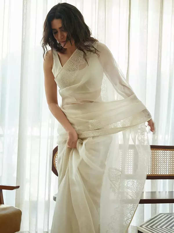 Karishma Tanna mesmerizes in a serene white saree, looking straight out of a dream