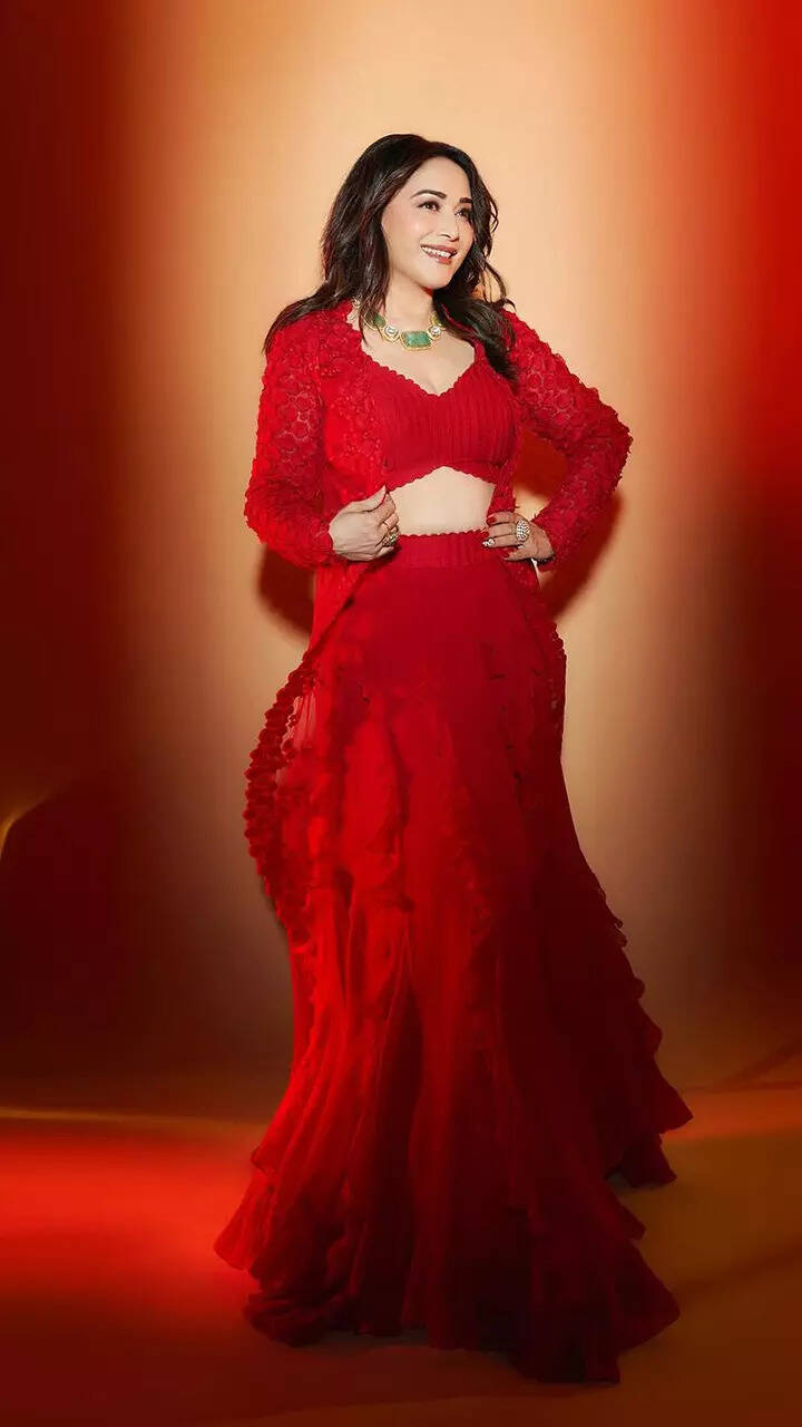 Madhuri Dixit displays the perfect fusion of tradition and style in red ruffle lehenga | Times of India Madhuri Dixit displays the perfect fusion of tradition and style in red ruffle lehenga | Times of India