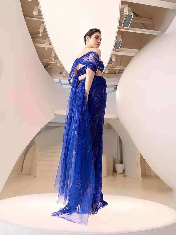 Tamannaah Bhatia shows a stylish fusion of sculpted elegance and sparkling crystals in Gaurav Gupta's cosmic gown, see pictures