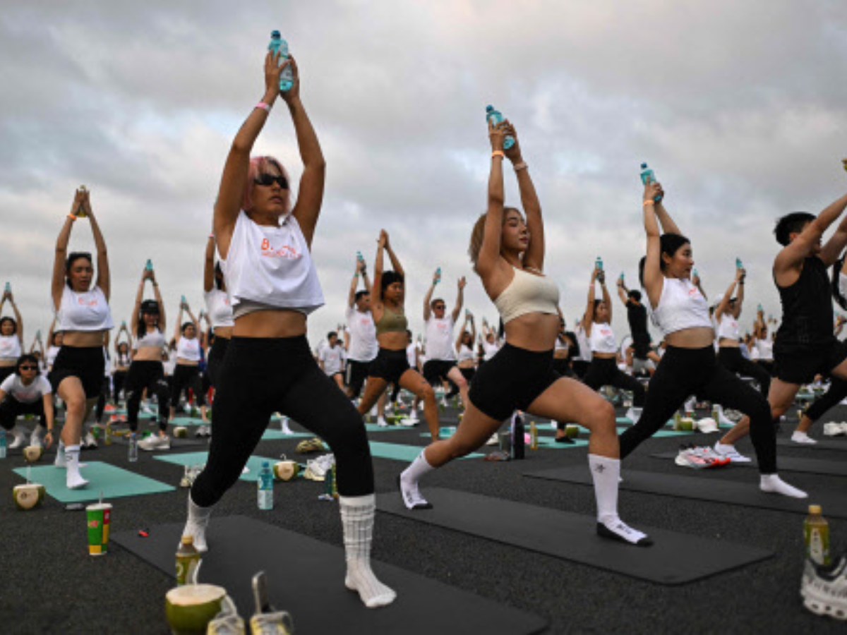 Yoga takes flight at Bangkok airport: Unique runway session amidst ...