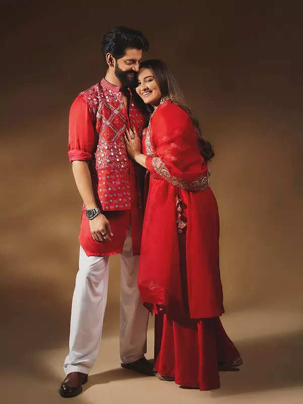 Sonakshi and Zaheer Dazzle in matching red outfits, perfectly coordinating their festive look