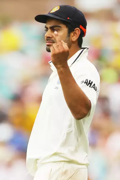 Kohli fined for showing middle finger